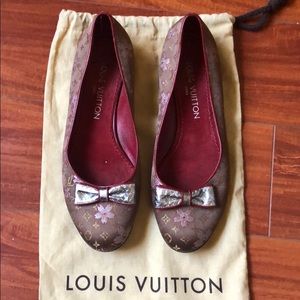 Louis Vuitton satin flats.
